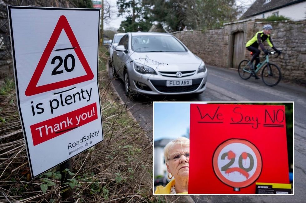 20mph speed limit road with cars and a protestor with an anti-20mph sign