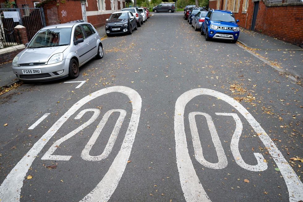 A 20mph speed limit marking on a residential road in the city centre in Cardiff, Wales