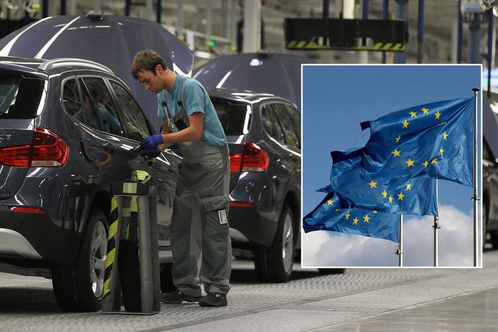 A BMW production factory and EU flags