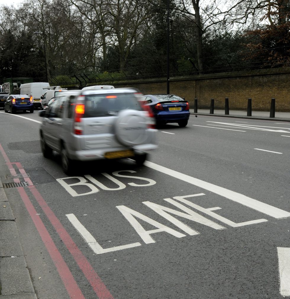 A car driving in a bus lane