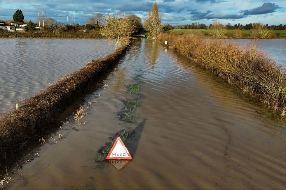 A flooded Eckington Road in Defford, Worcestershire