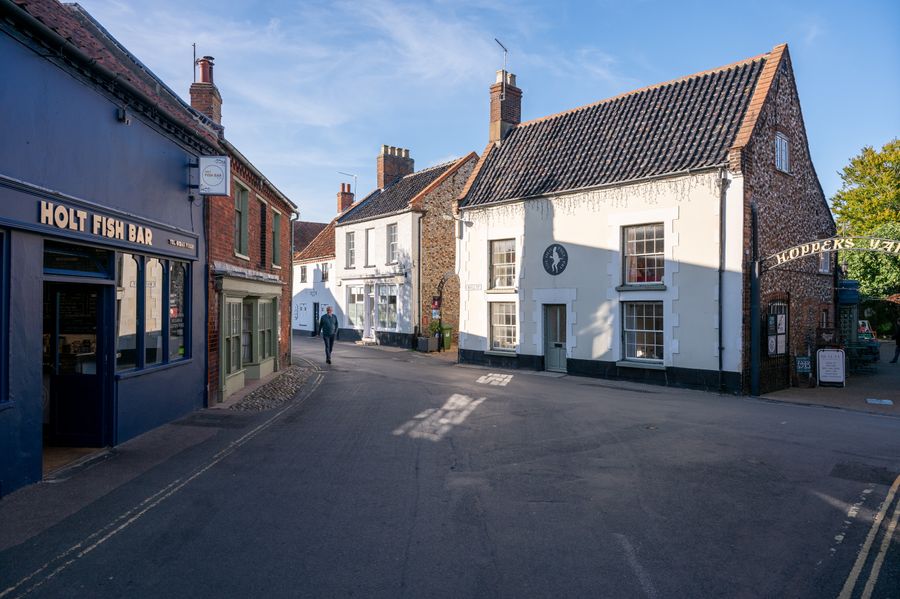 A general view of residential and business properties on September 16, 2024 in Holt, United Kingdom