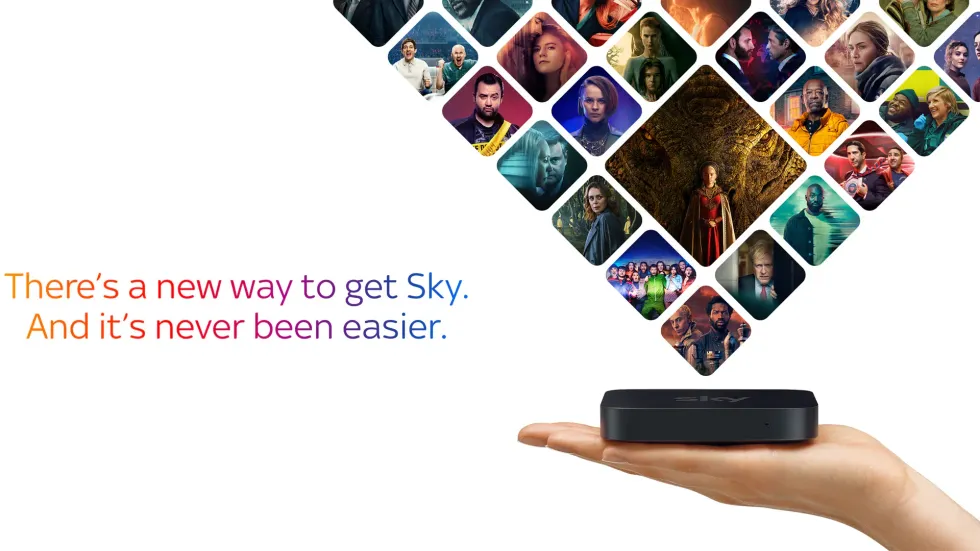 a hand holds the sky stream box with previews of the biggest shows