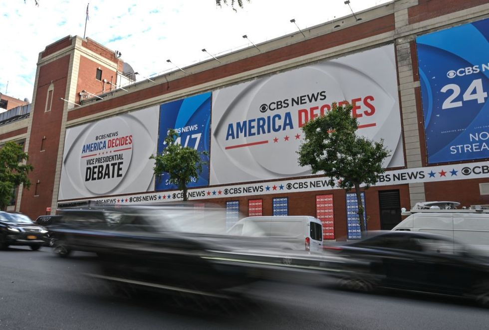 A large banner hangs outside CBS Studios promoting the Vice Presidential Debate on September 30, 2024 in New York