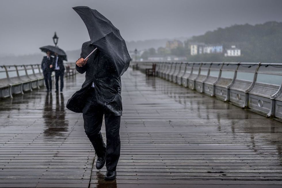 A man walking in the wind