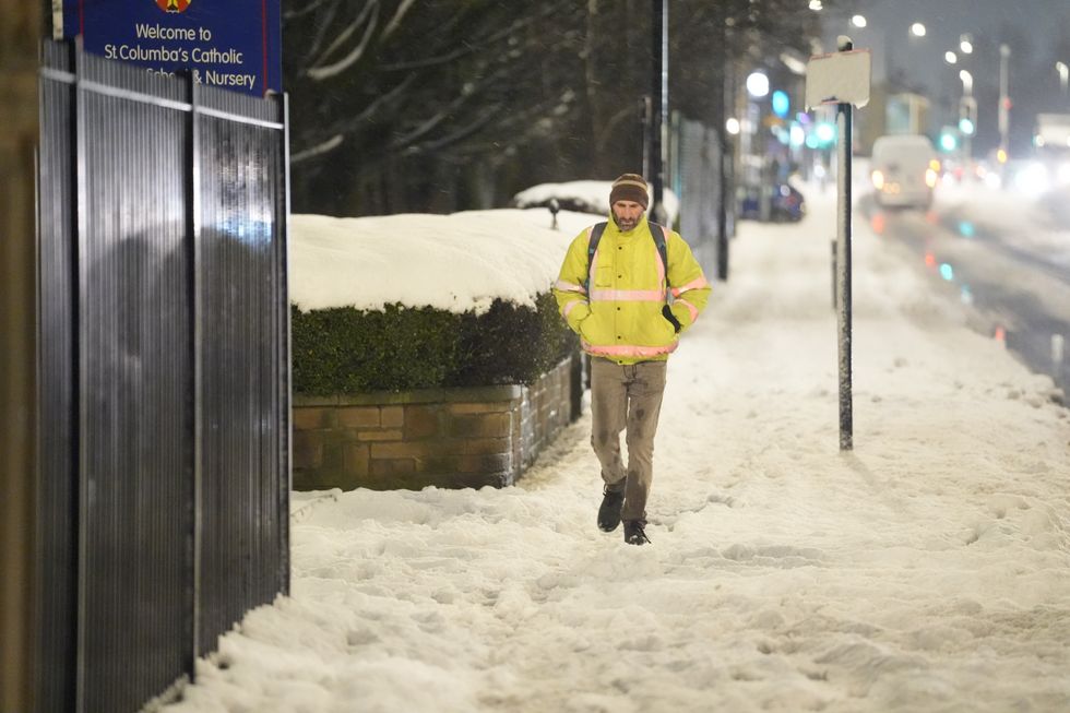 A man walks through snow in Bradford on January 6