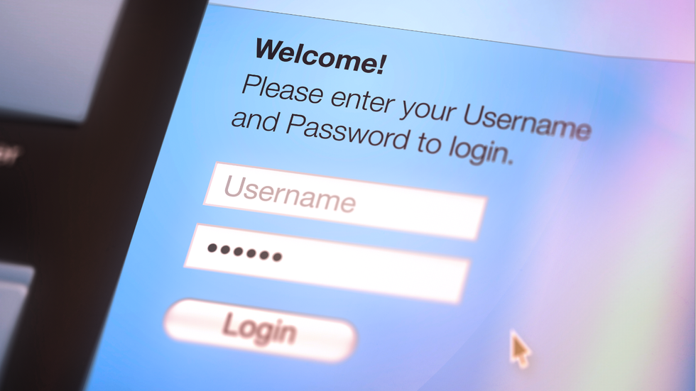 a mouse cursor moves over the Login box as someone has typed in a password into the text field 