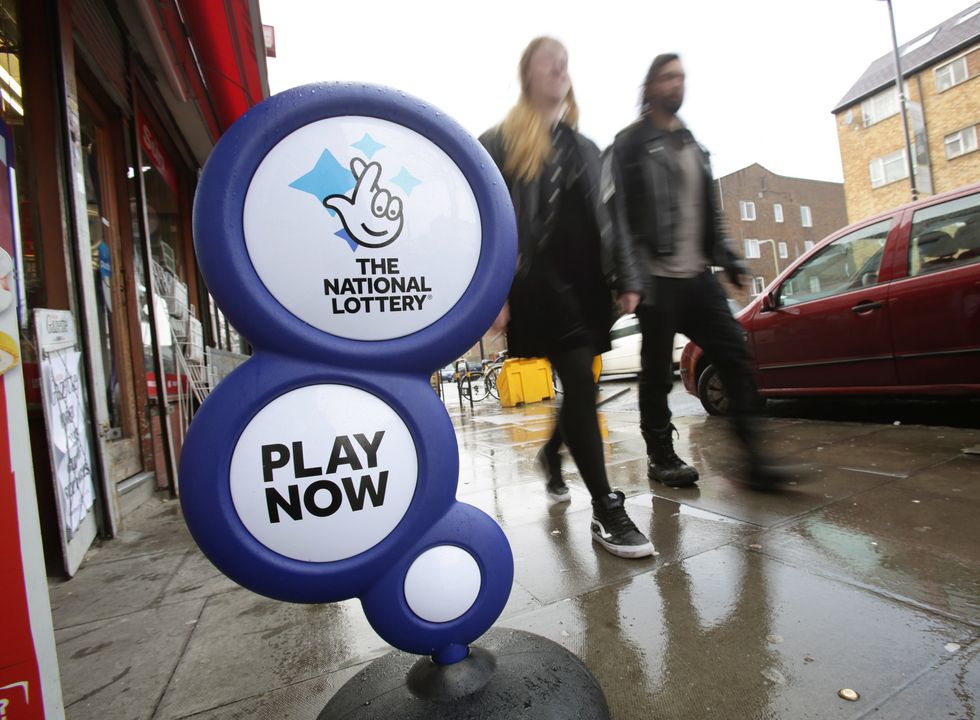 A National Lottery sign outside a newsagent in north London.