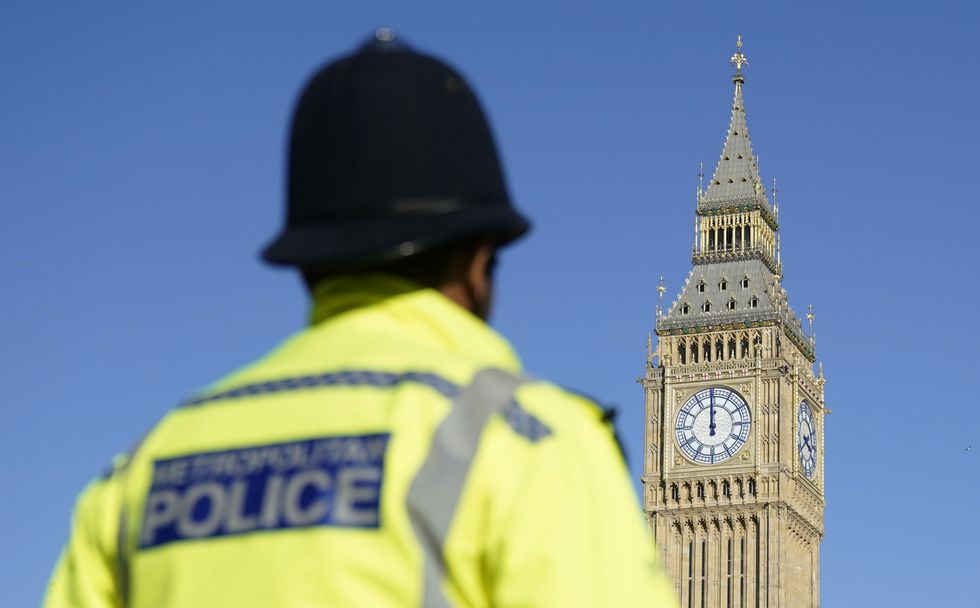 A police officer stood in front of Big Ben