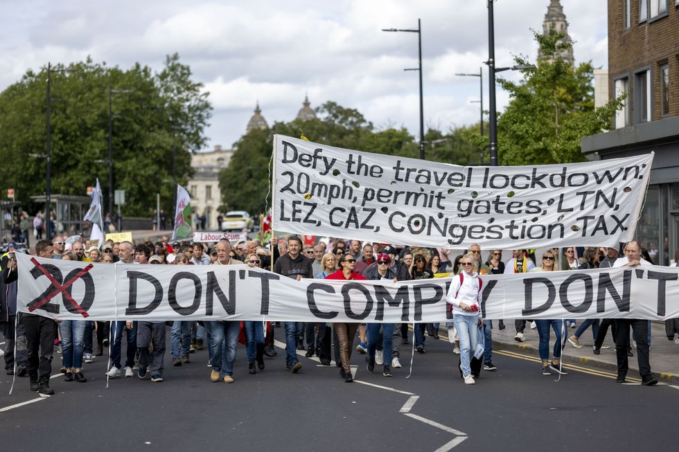 A protest against 20mph speed limits makes its way through the city centre on September 23, 2023 in Cardiff, Wales