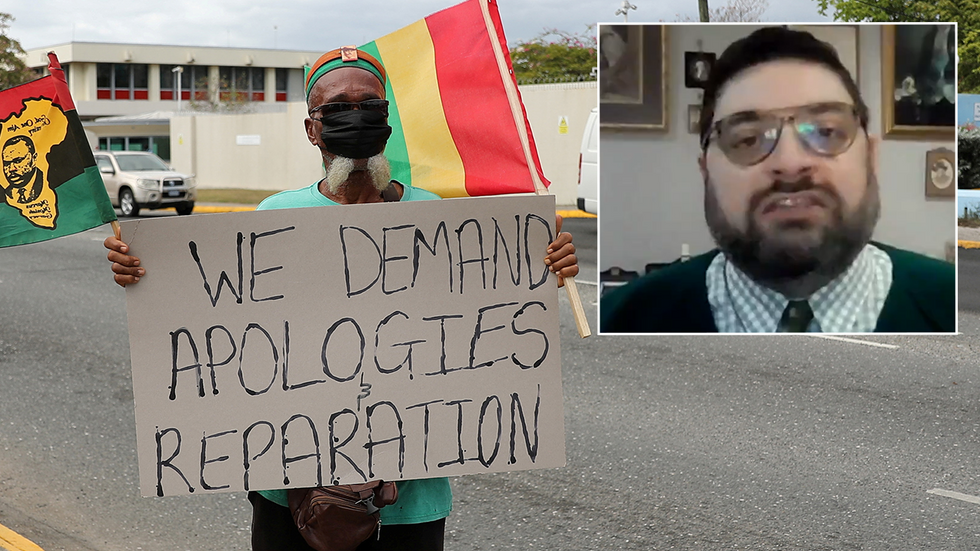 A protester calls for reparations and Rafe Heydel-Mankoo