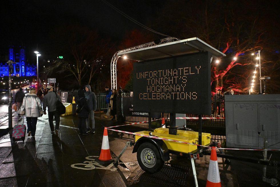 A sign displaying a message in Edinburgh after all outdoor events including the street party and fireworks display planned for Edinburgh's New Year were cancelled due to bad weather