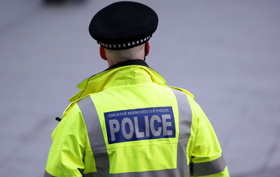 A stock imag of a Greater Manchester Police officer