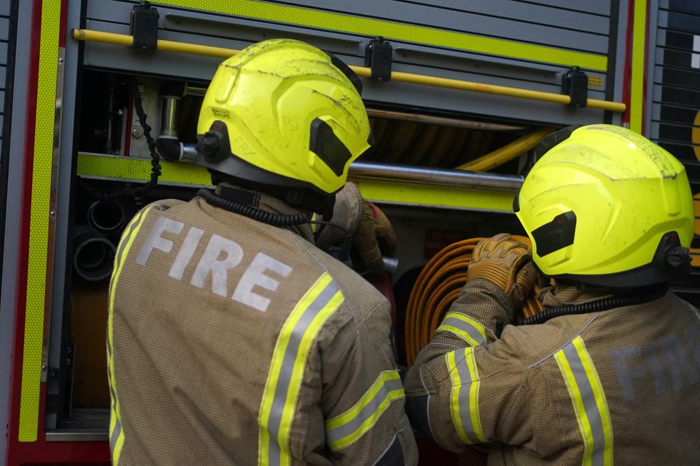 A stock image of firefighters