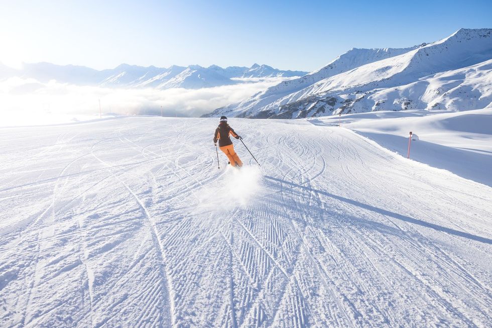 A stock image of somebody skiing