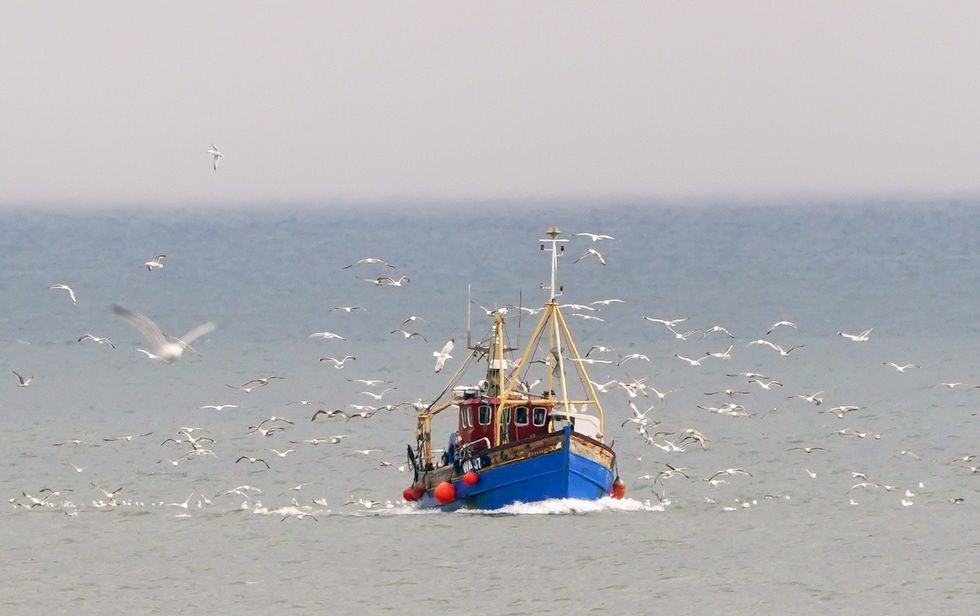 A trawler returns to the North Shields fish quay with its catch from the North Sea