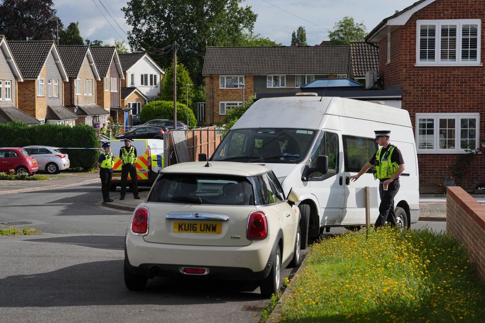 A view of police at the scene in Ashlyn Close, Bushey, Hertfordshire