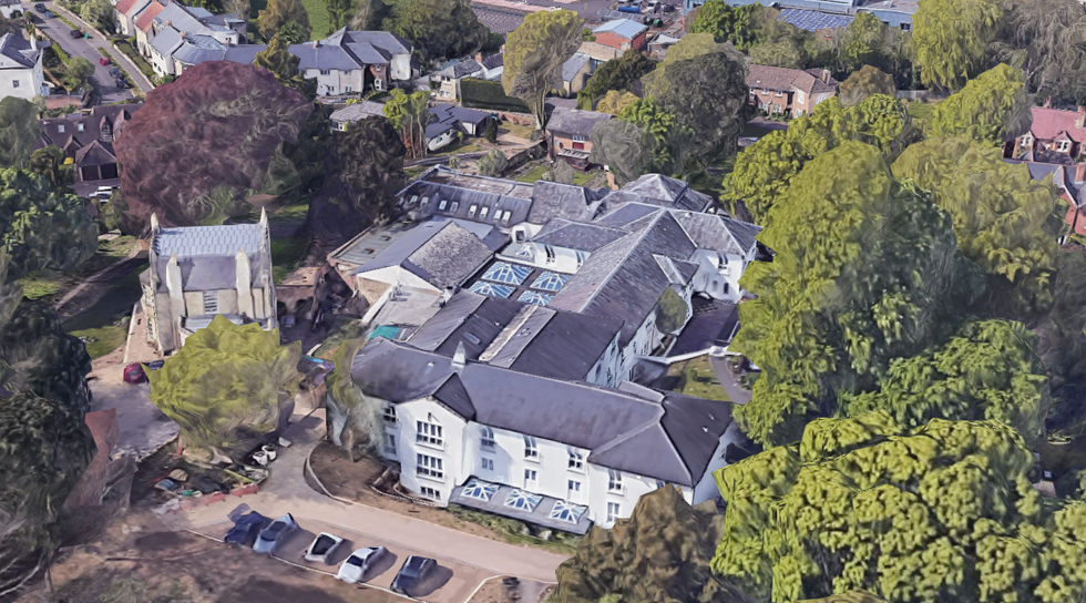 Aerial view of property and hotel