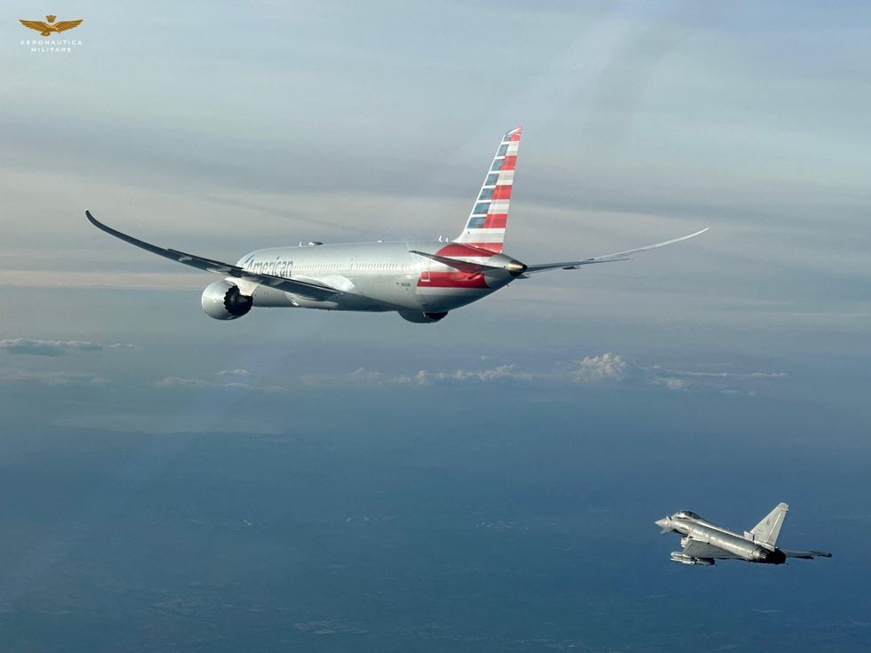 American airlines flight escorted by fighter jets