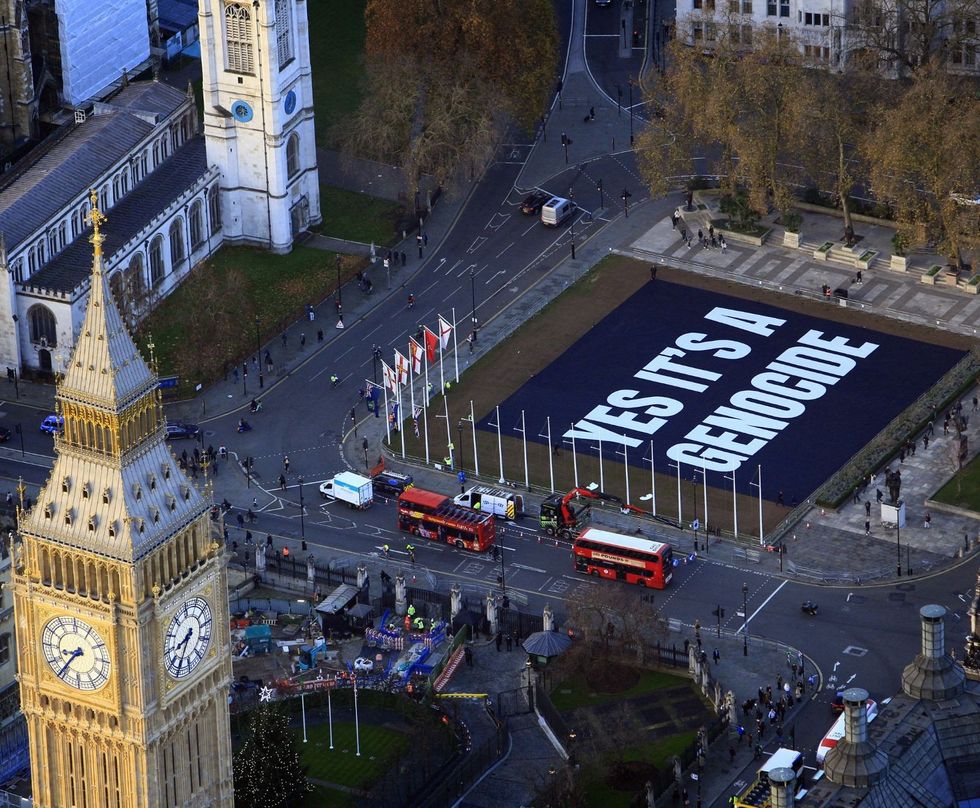 An anti-Israel banner was unveiled outside Parliament