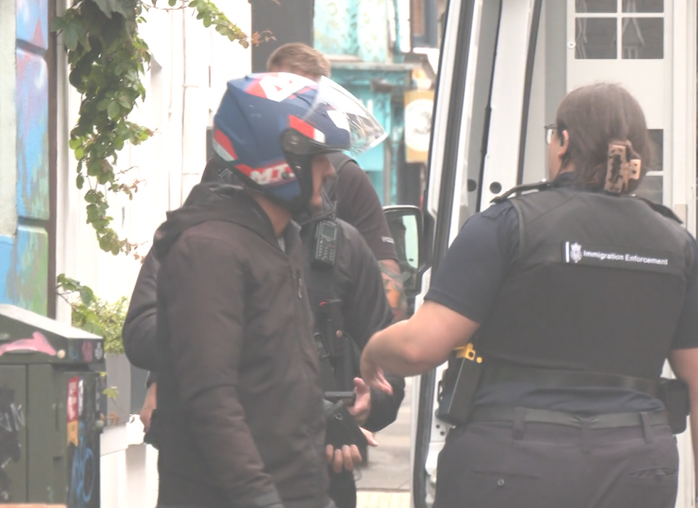 An image of an undocumented immigrant working as a food delivery driver