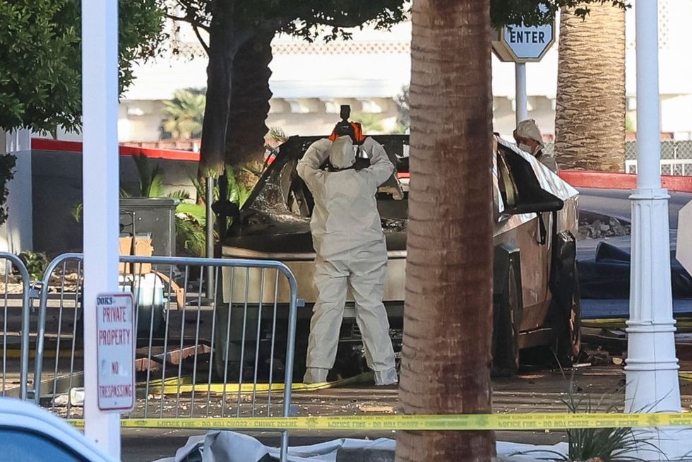 An investigator photographs a Tesla Cybertruck that exploded outside the lobby of the Trump International hotel in Las Vegas\u200b