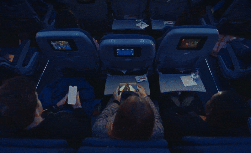 animated gif of a man watching napoleon on a cinema screen in the vision pro 