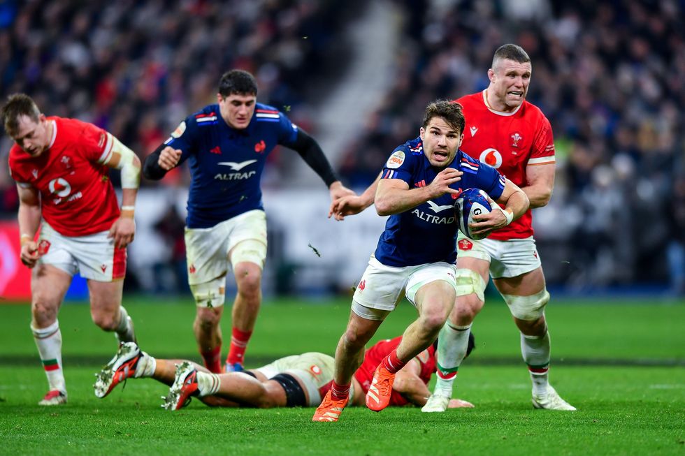 Antoine Dupont making a break against Wales in Paris