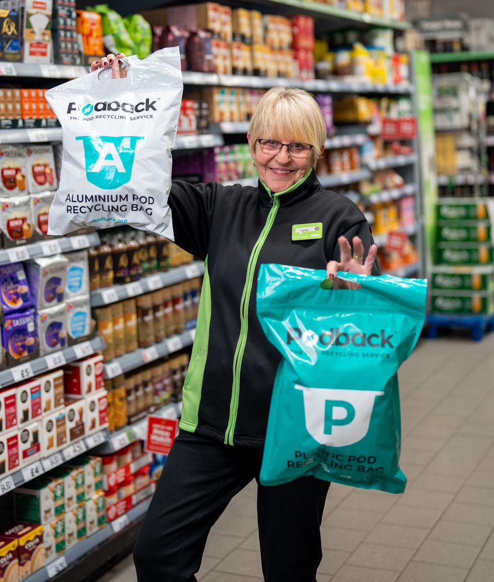 Asda colleague holding podback bags