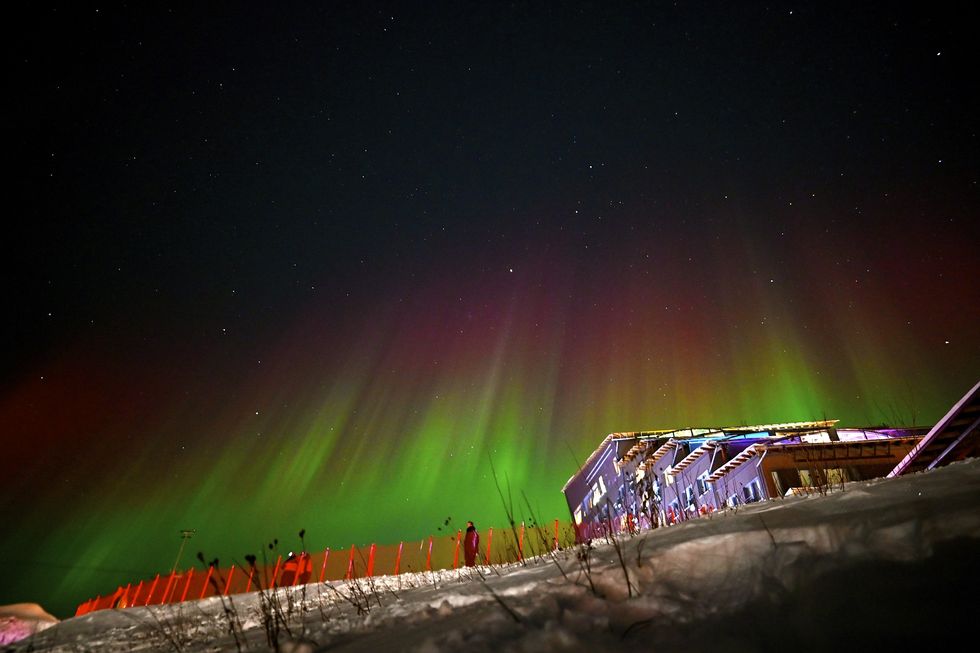 Aurora Borealis over ski slope in Levi, Lapland, in the new year on January 01, 2025