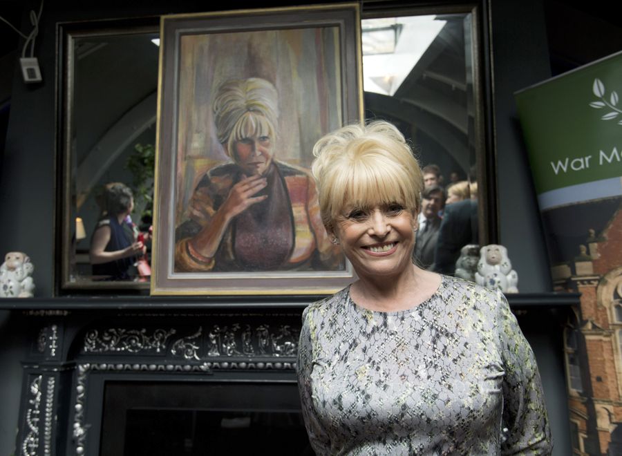 Barbara Windsor with her portrait