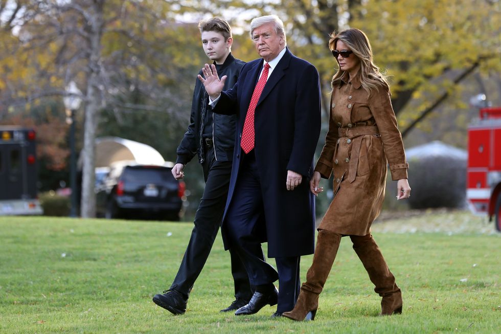 Barron (left), Donald (centre) and Melania (right)