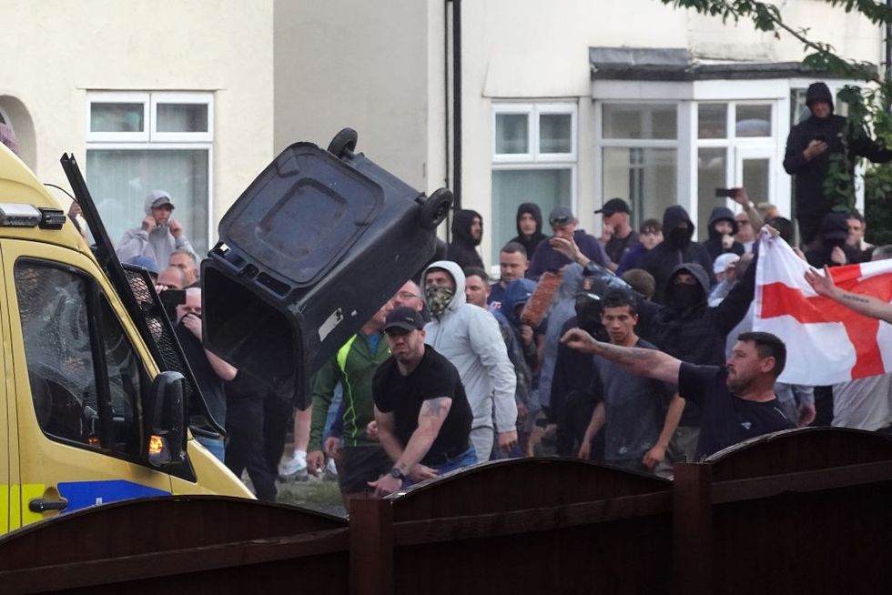 Bins were thrown at police vehicles