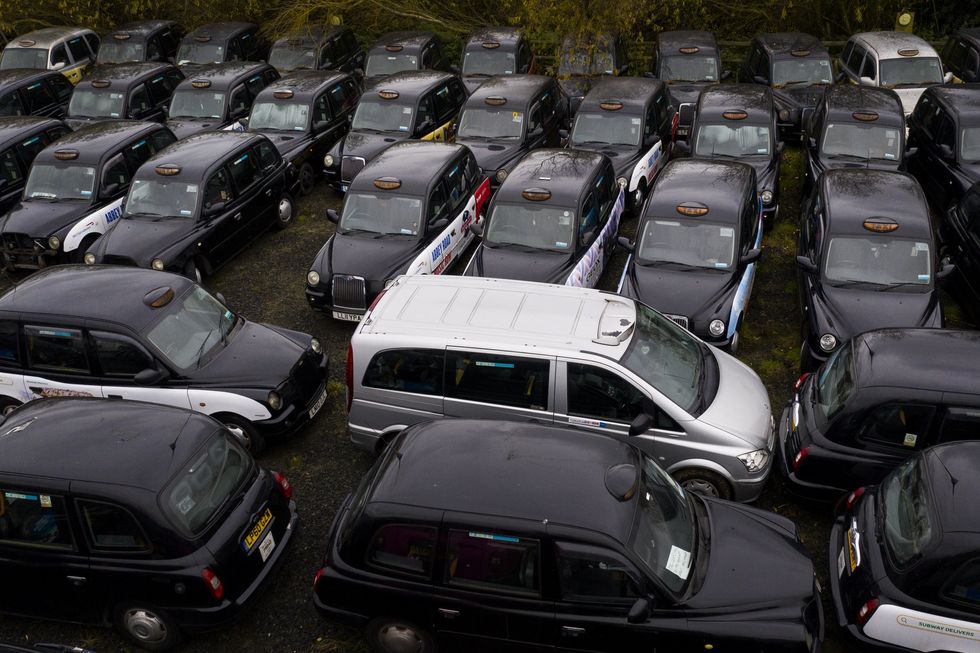 Black cabs parked