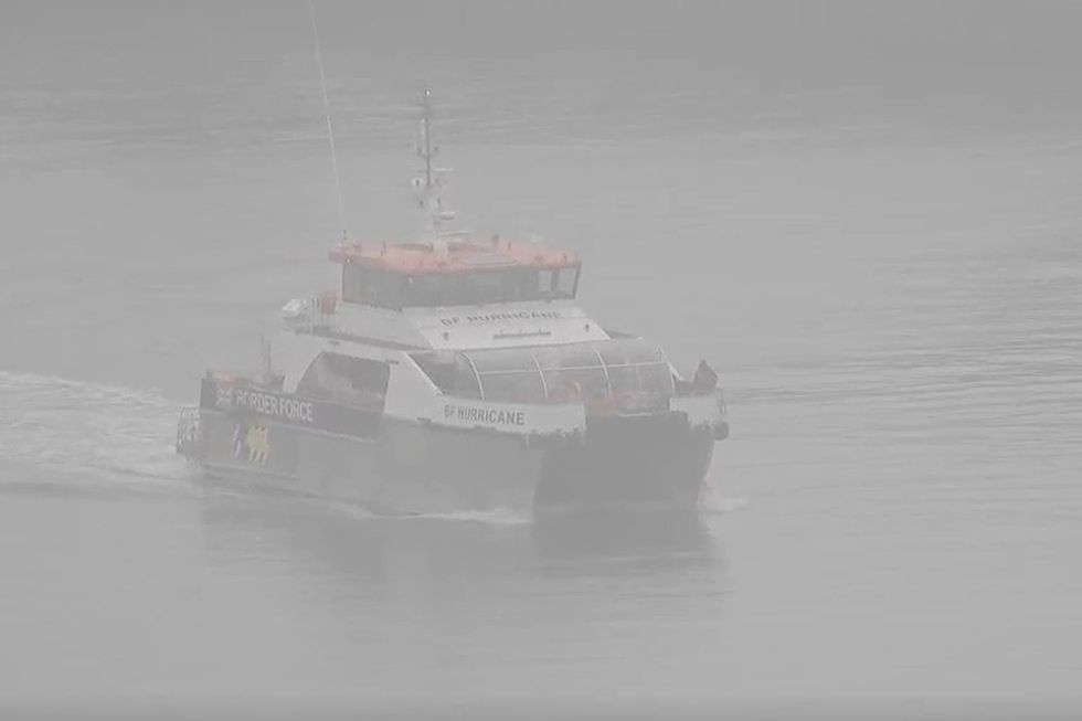 Border Force Hurricane vessel arriving in Dover with migrants