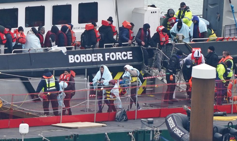 Border Force in Dover deal with people who have crossed the Channel