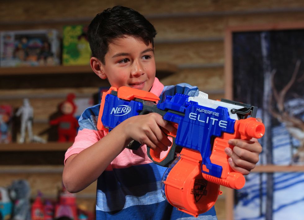 Boy holding Nerf gun