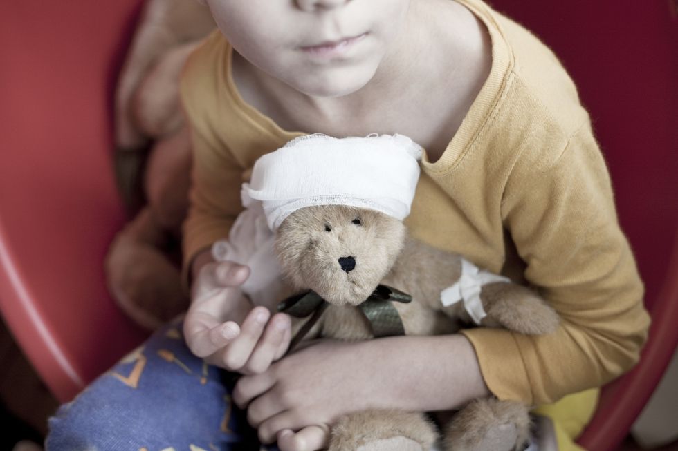 Boy with teddy bear