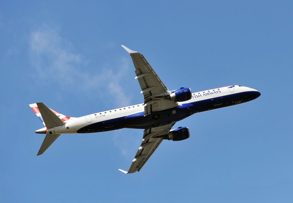 British Airways (BA CityFlyer) Embraer EMB-190 jet , taking off from London City Airport in east London