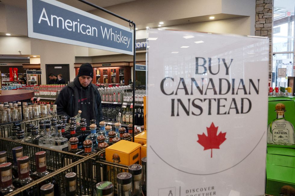 Canadian shop with 'Buy Canadian Instead' signs in response to Trump's tariffs