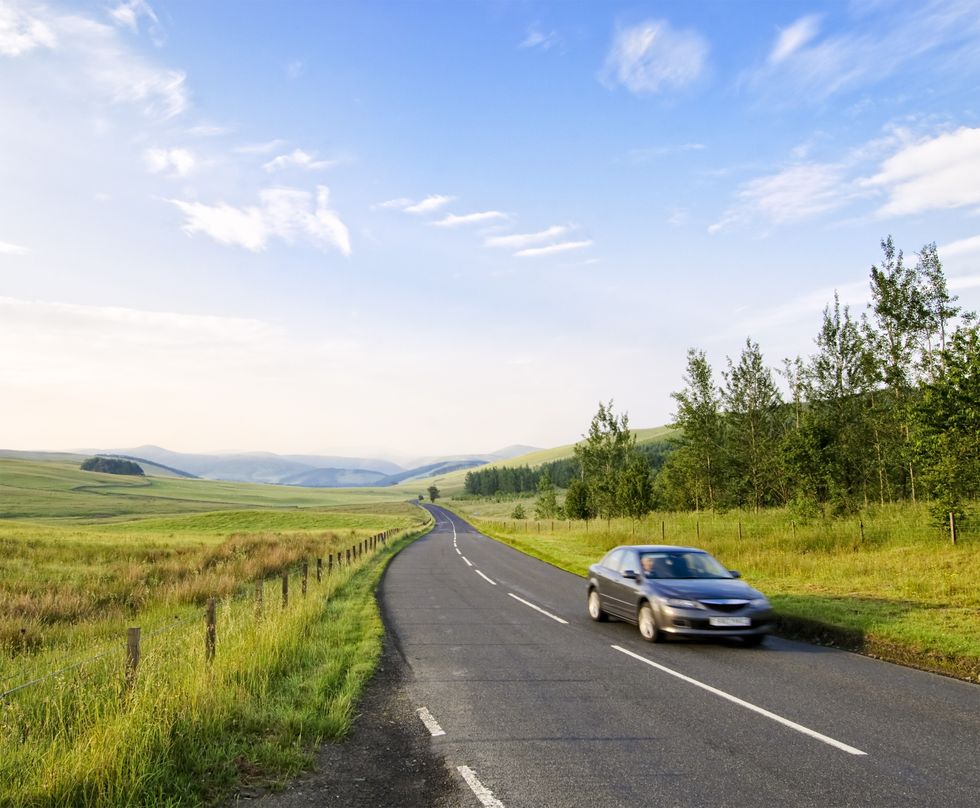 Car driving in countryside