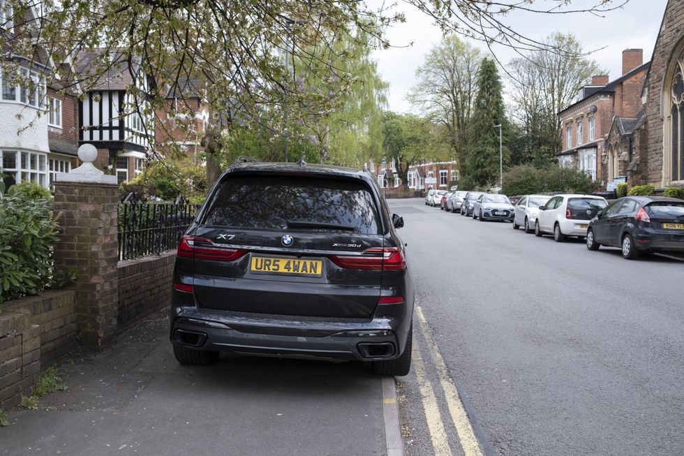 Car parked on pavement 