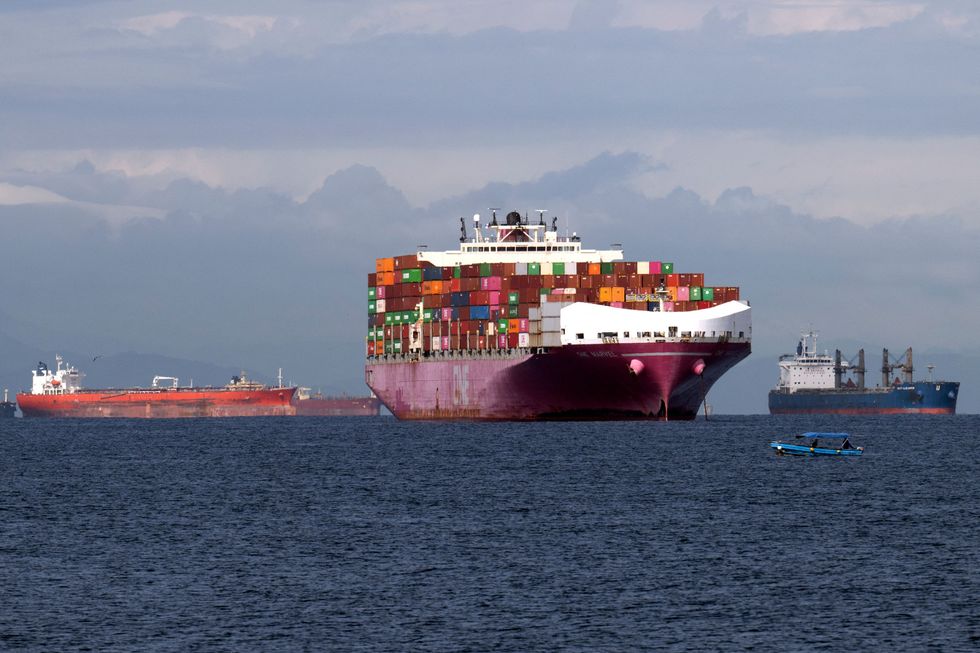 Cargo ships wait at the entrance of the Panama Canal 