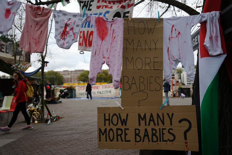 Children's clothing ion display as people take part in a Palestine Solidarity Campaign rally in central Londonu200b