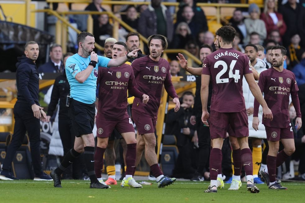 Chris Kavanagh was mobbed by the players