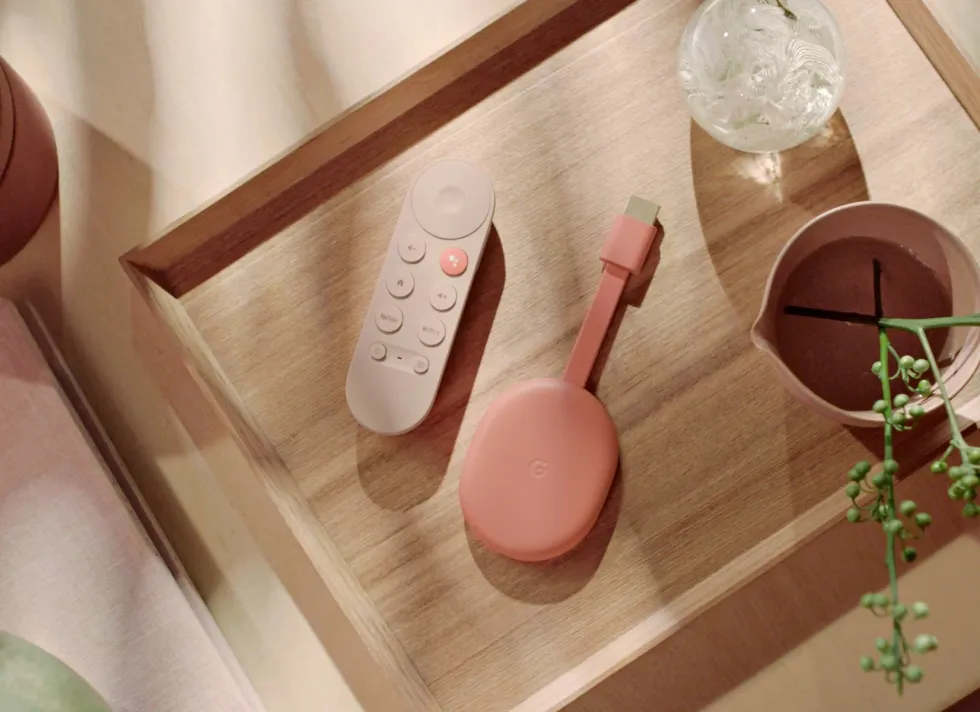 chromecast with google tv in the sunrise shade pictured on a small coffee table