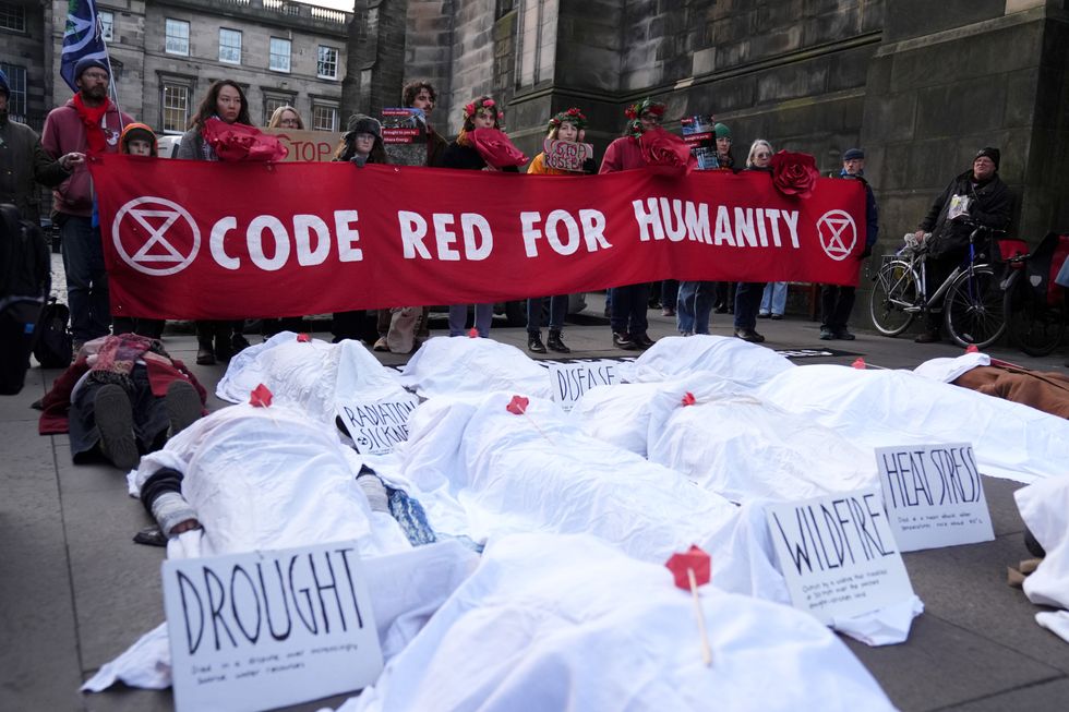 Climate activists from Greenpeace and Uplift during a demonstration outside the Scottish Court of Sessionu200b