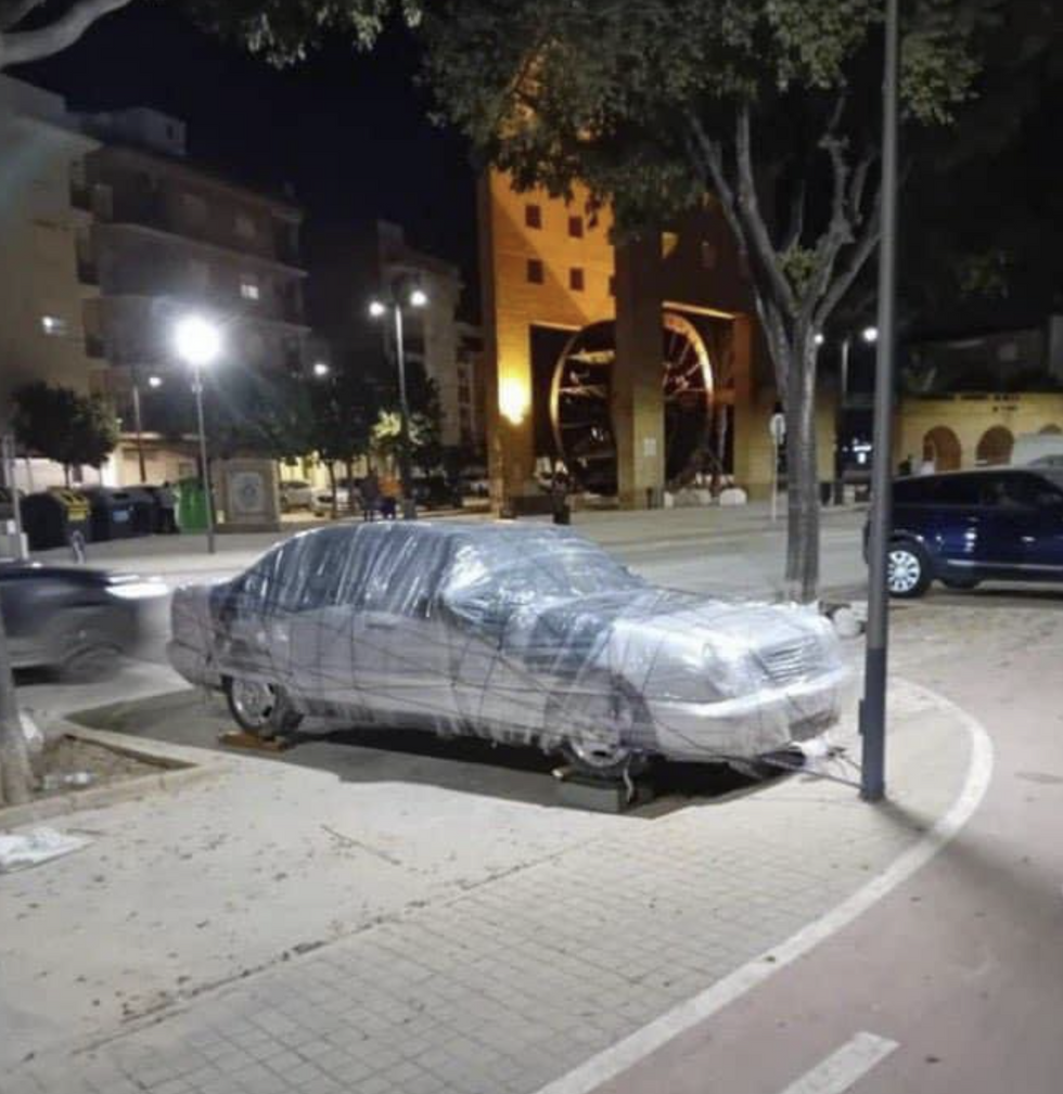 Clingfilm-wrapped cars