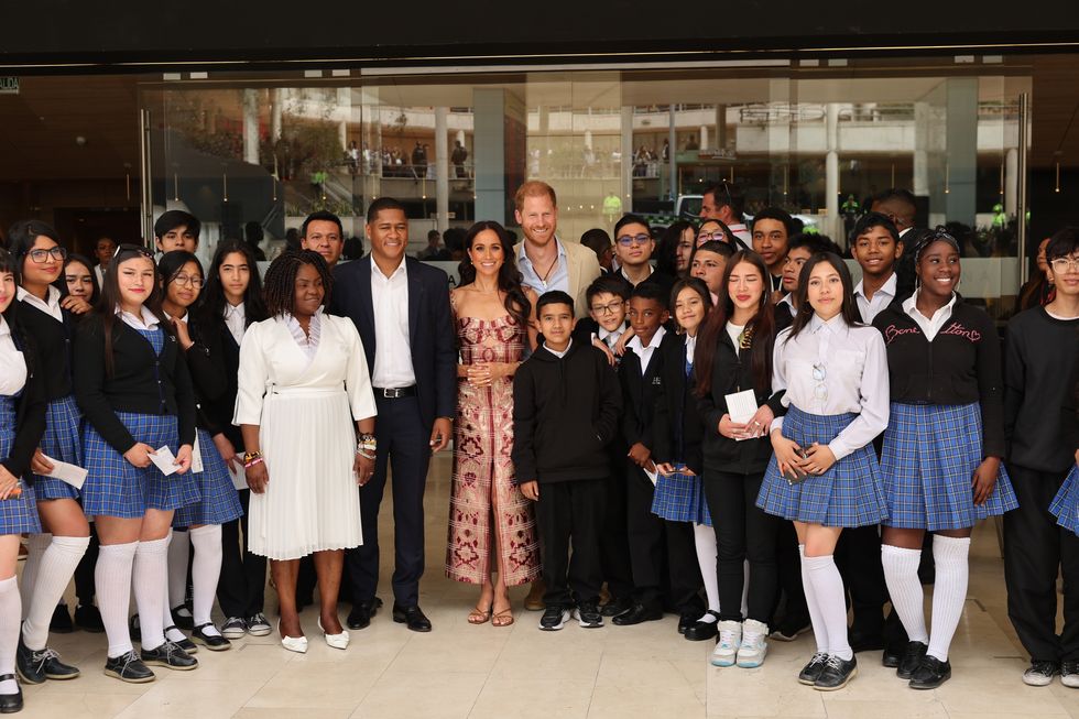 Colombia Vice President Francia Mu00e1rquez, Yerney Pinillo, Meghan, Duchess of Sussex and Prince Harry, Duke of Sussex with schoolchildren