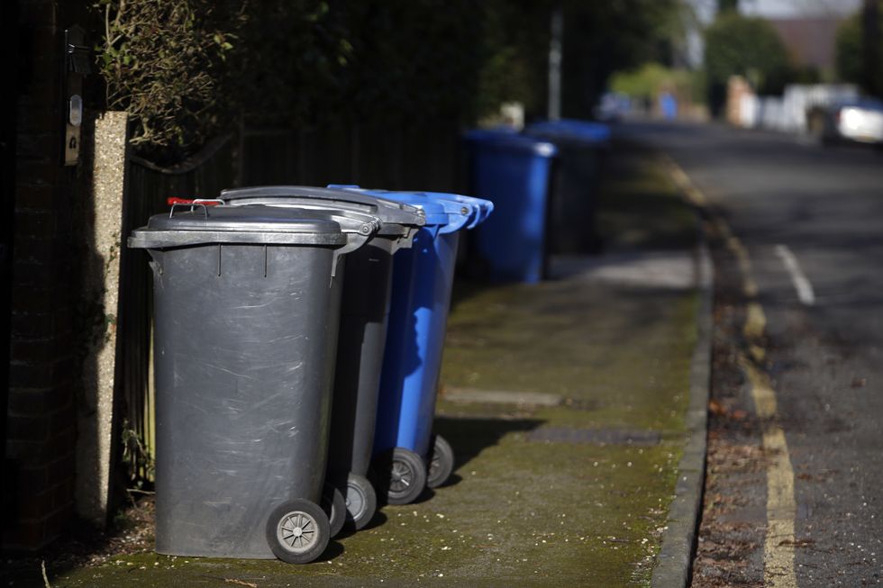 Council slashes black bin collections to just once every three weeks despite pleas from locals